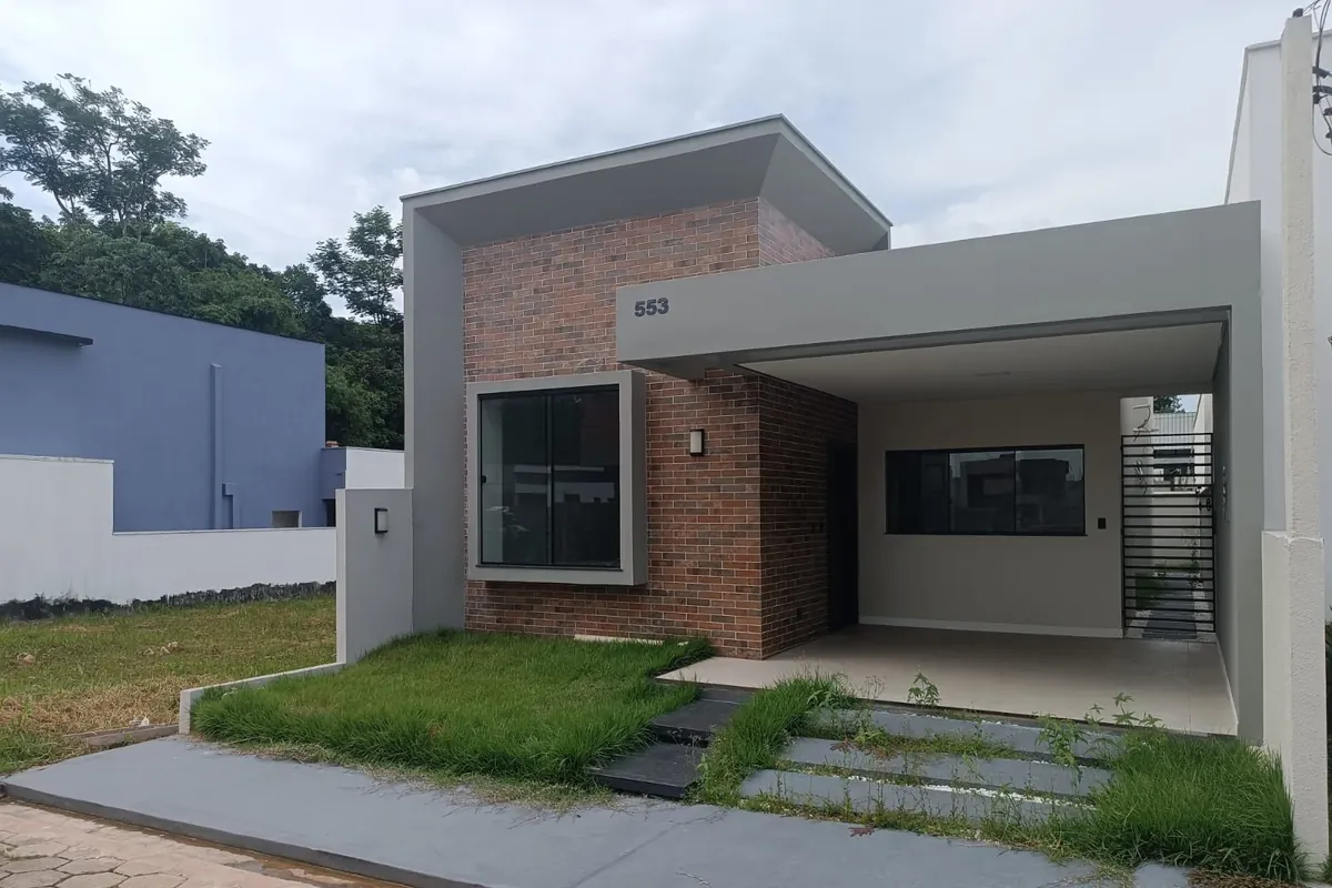 Residência 553 do Porto Marina vista em perspectiva, com painel de tijolinho aparente